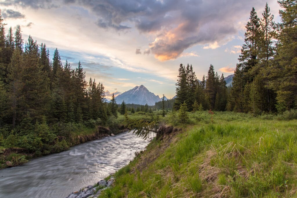 Sun setting across Kananaskis Country, Alberta, Canada