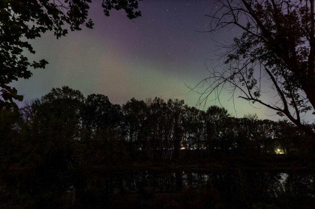 Viewing the auroras over the Grand River at Riverside park in Grand Haven