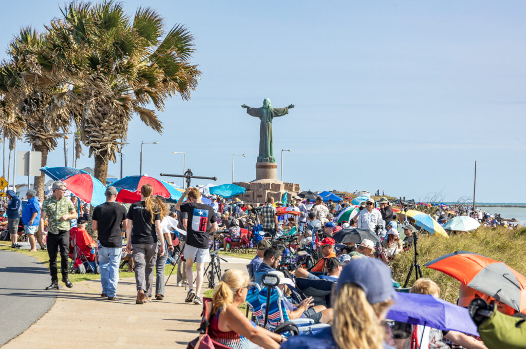 Crowds around Jesus Christ of the Fisherman Statue